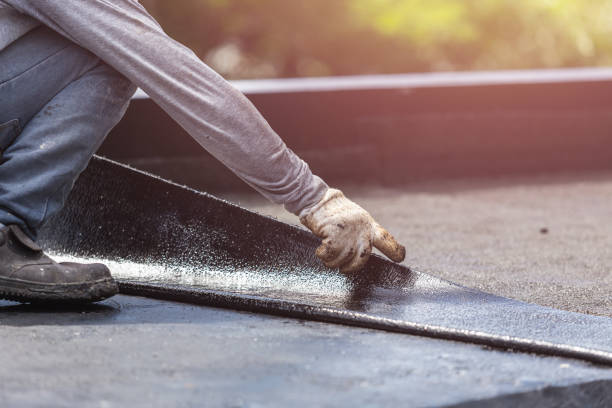 Professional Waterproofing technician working in Adamsville, OH